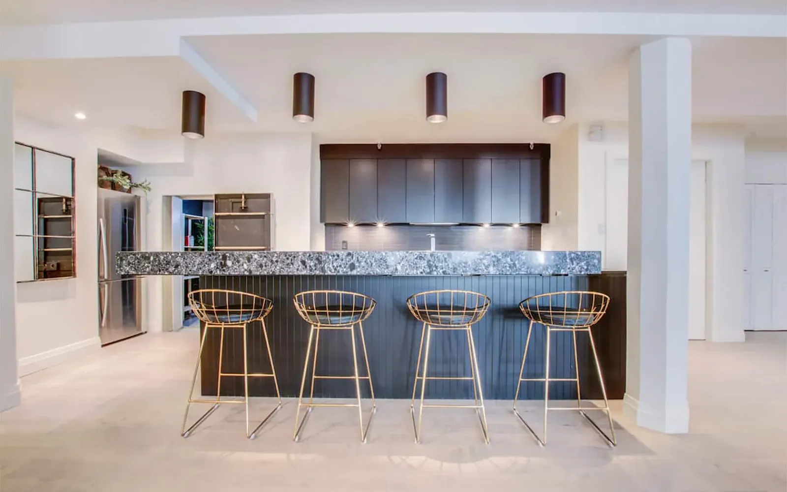 Modern custom kitchen remodeled in Montreal with quartz countertops
